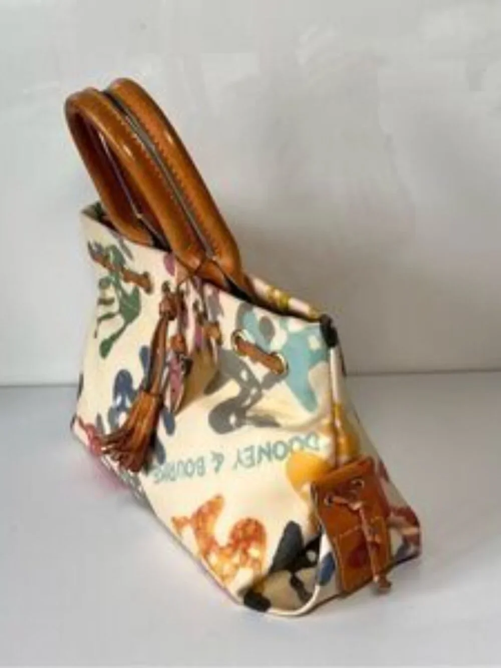 DOONEY & BOURKE Authentic Vintage Y2K Leather Baby Hands Print Tassel Bag